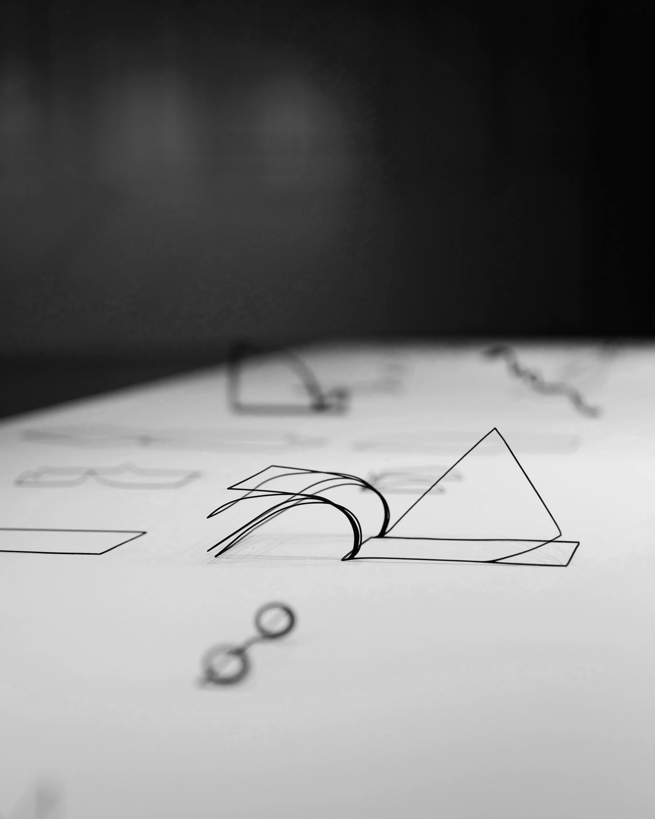 Hand-drawn architectural concept sketches on paper — translating design intent into operational and commercial structure.