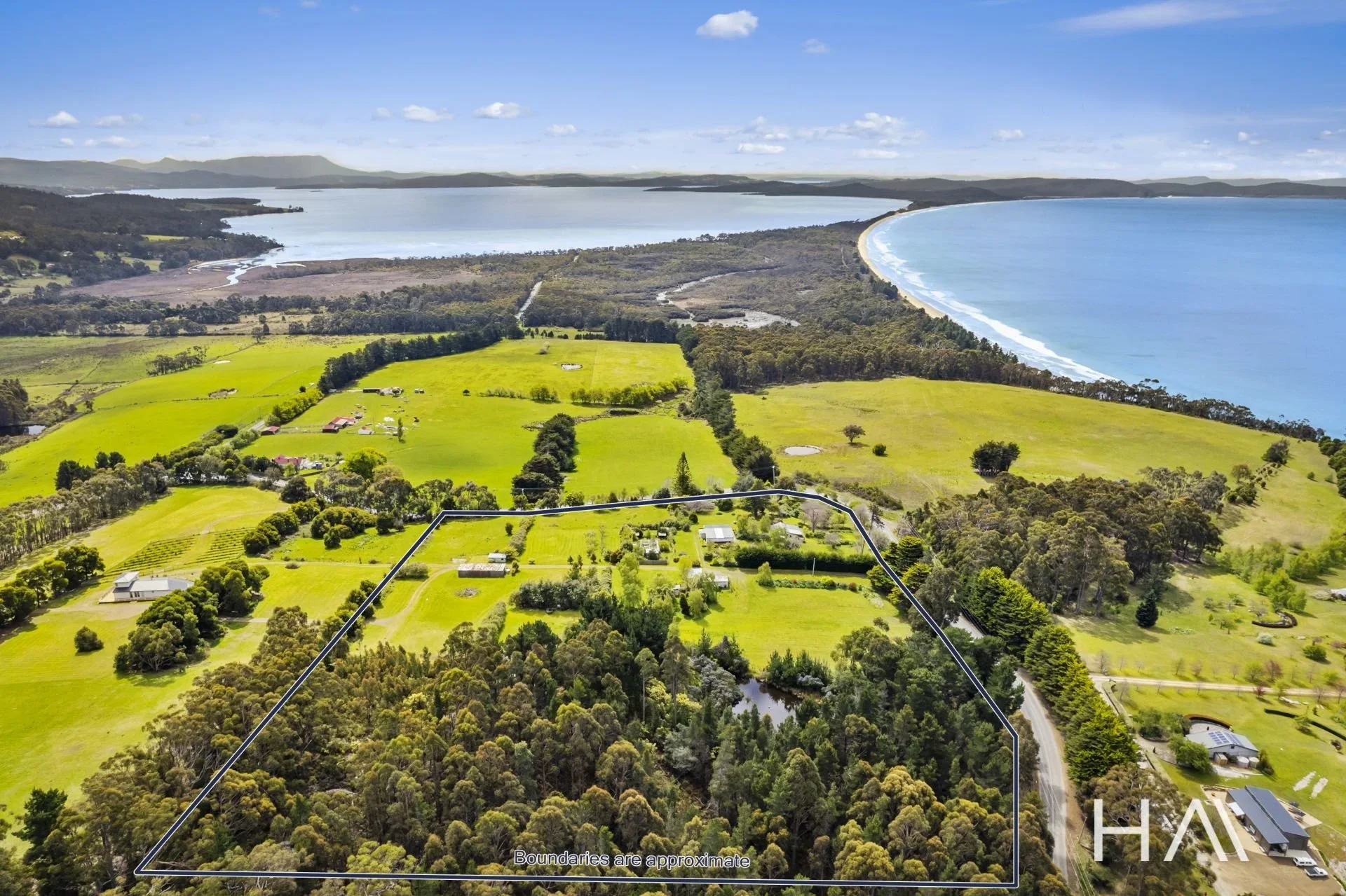 Three Dwellings on Stunning Acreage Offers Rare Island Retreat