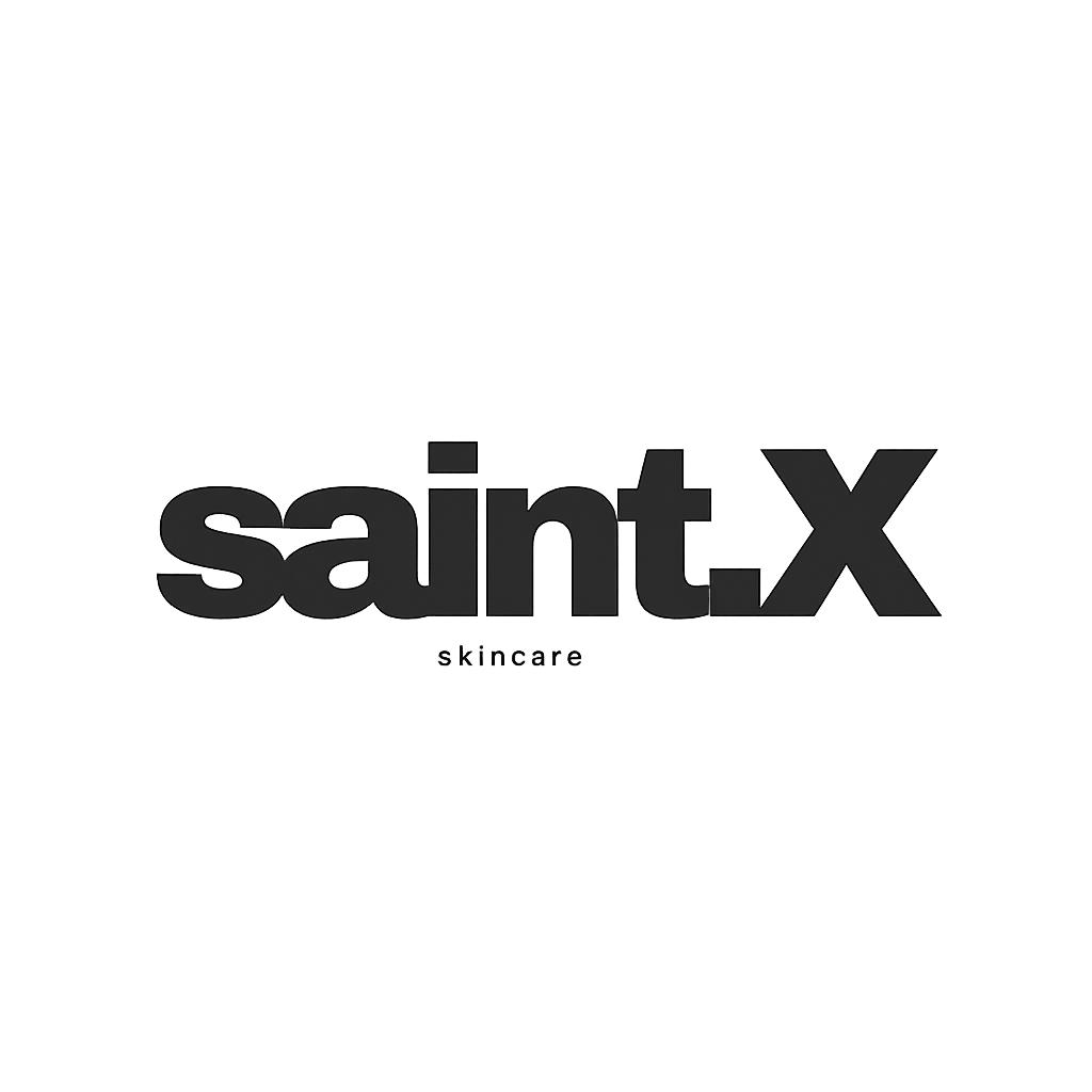 Black logo for 'saintx skincare' on a gray wall.