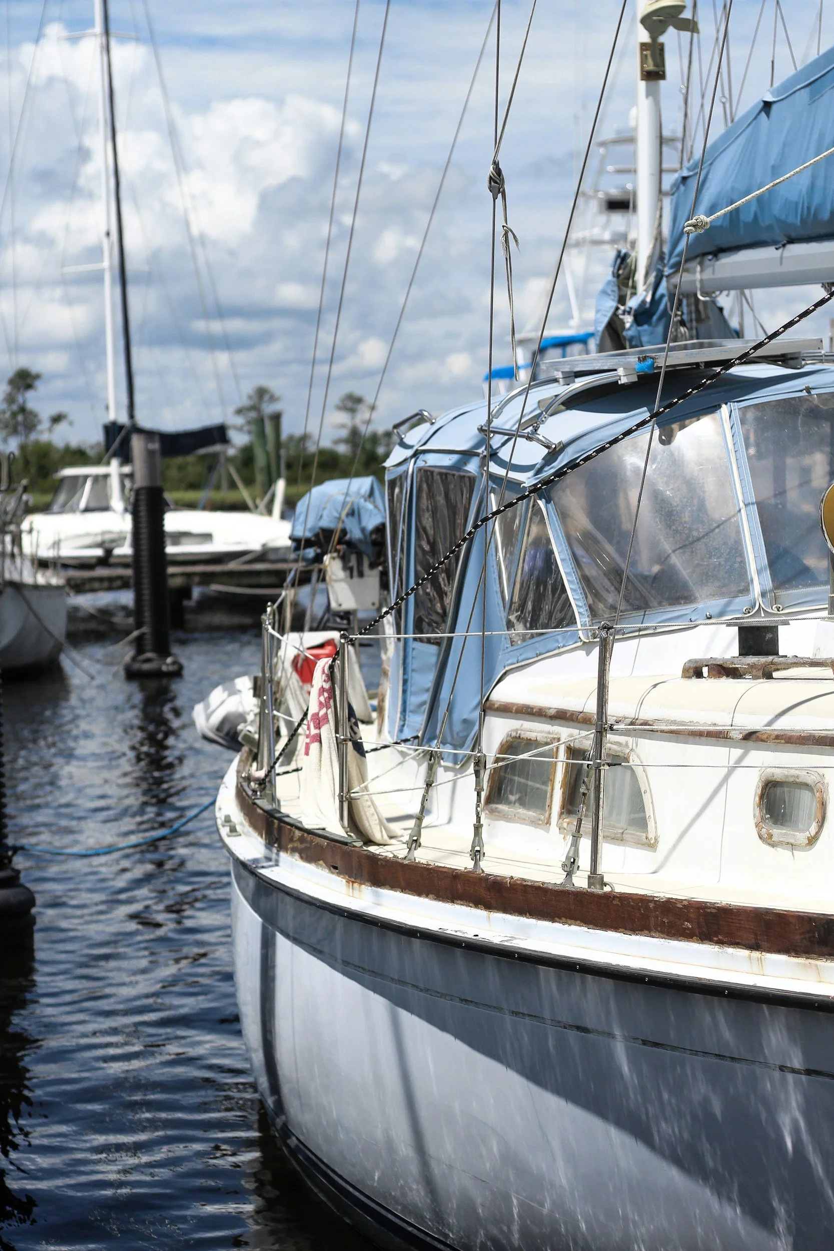 Older boat in Auckland Marina's needing some care and maintenance to ensure it is safe and well looked after.