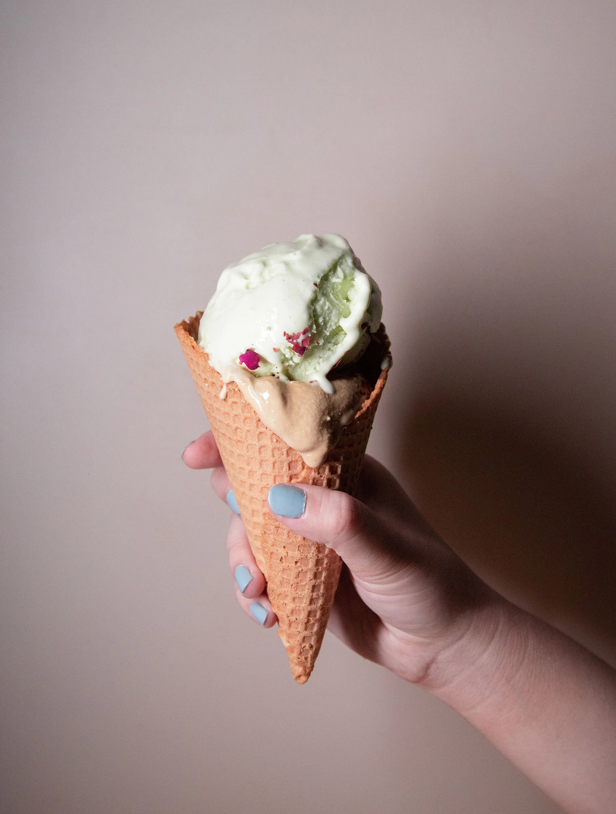 Hand holding ice cream