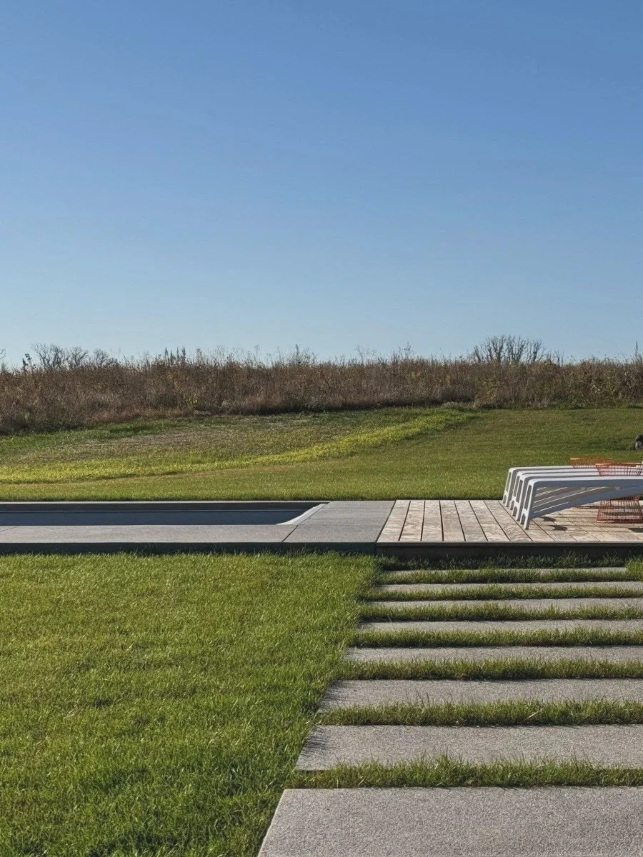 The landscape at Prairie Air is a series of simple gestures that invite you outdoors.

A cocktail pool, sun deck, and pickleball court are nestled into the hillside. 

Corten steel, etched concrete, and thermally modified wood bring continuity to the