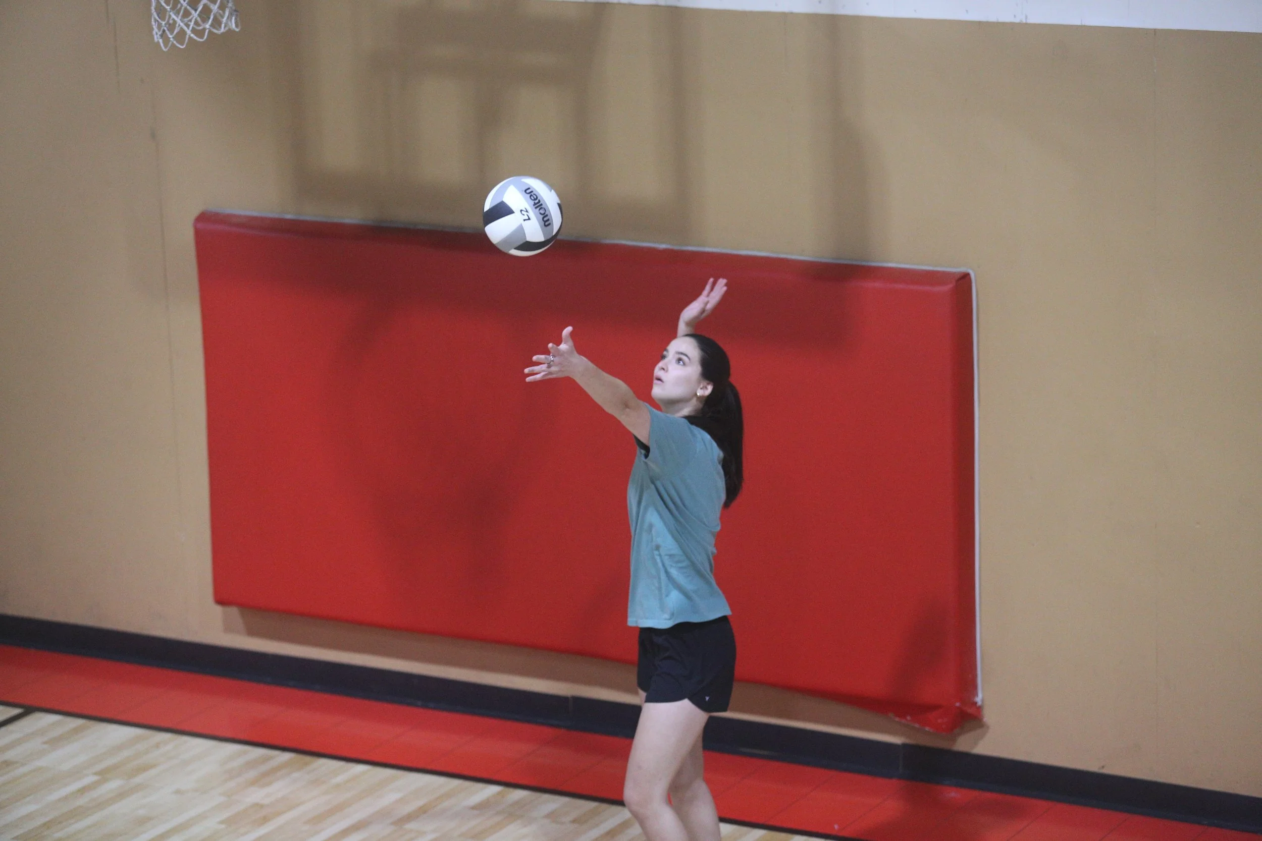 Action intensifies in church league volleyball