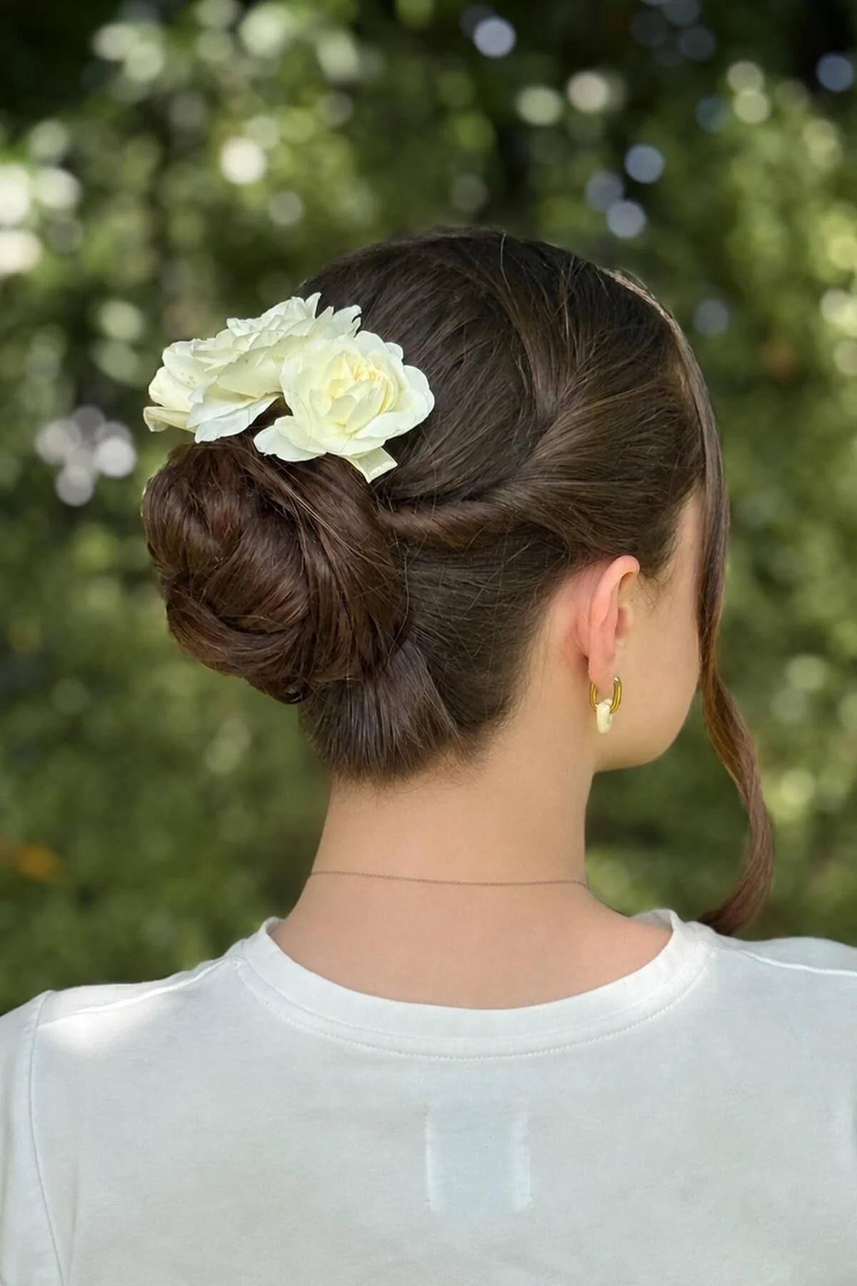 bridal-low-bun-wedding-hairstyle-floral-detail.jpg