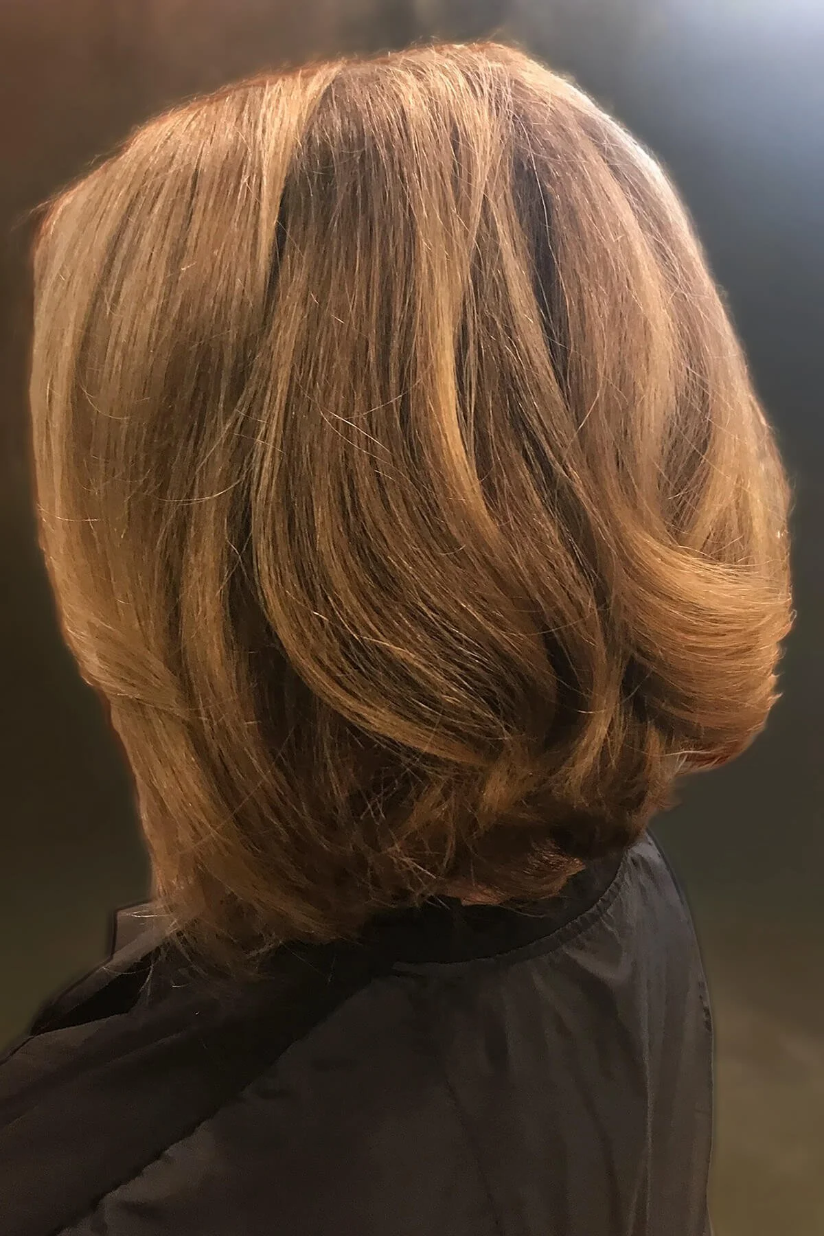 Short layered hairstyle styled by Meg in Mill Valley, creating polished, manageable hair with natural movement.