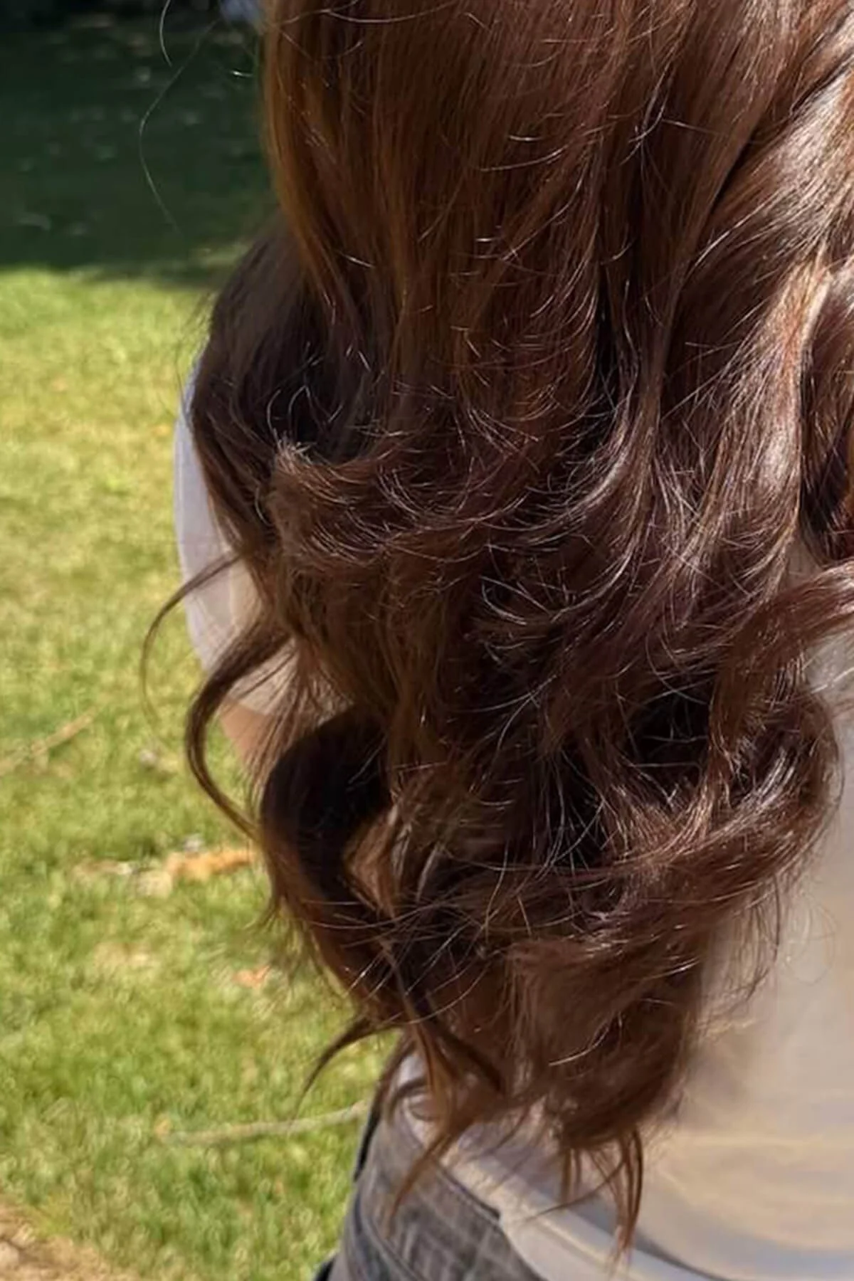 Long polished hairstyle created by Meg, a hairstylist in Mill Valley specializing in healthy, effortless hair styling.