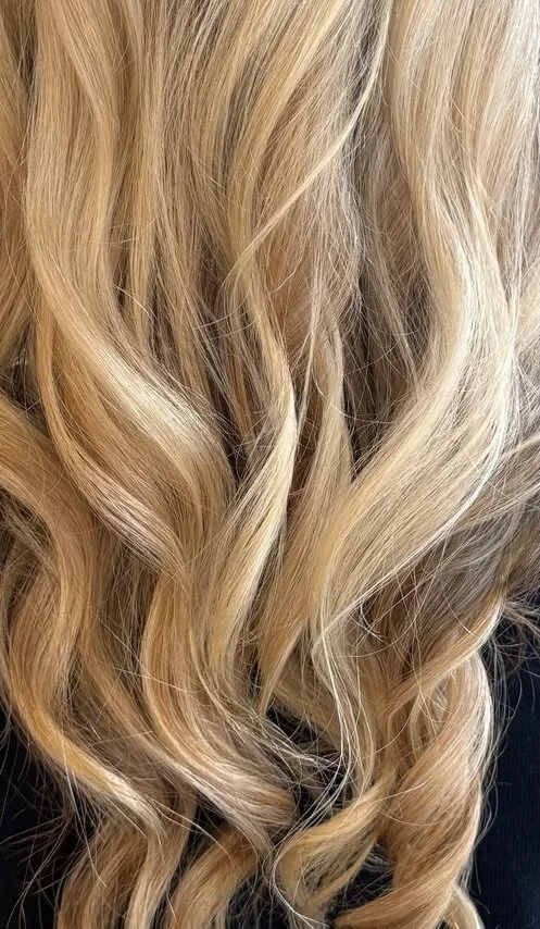 Natural blonde hair color with seamless grey coverage and soft dimension after a personalized tint service in Mill Valley, Marin County.