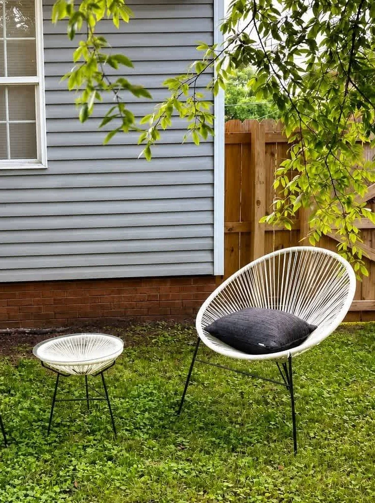 Backyard patio seating at a two-bedroom duplex short-term rental in Raleigh, North Carolina