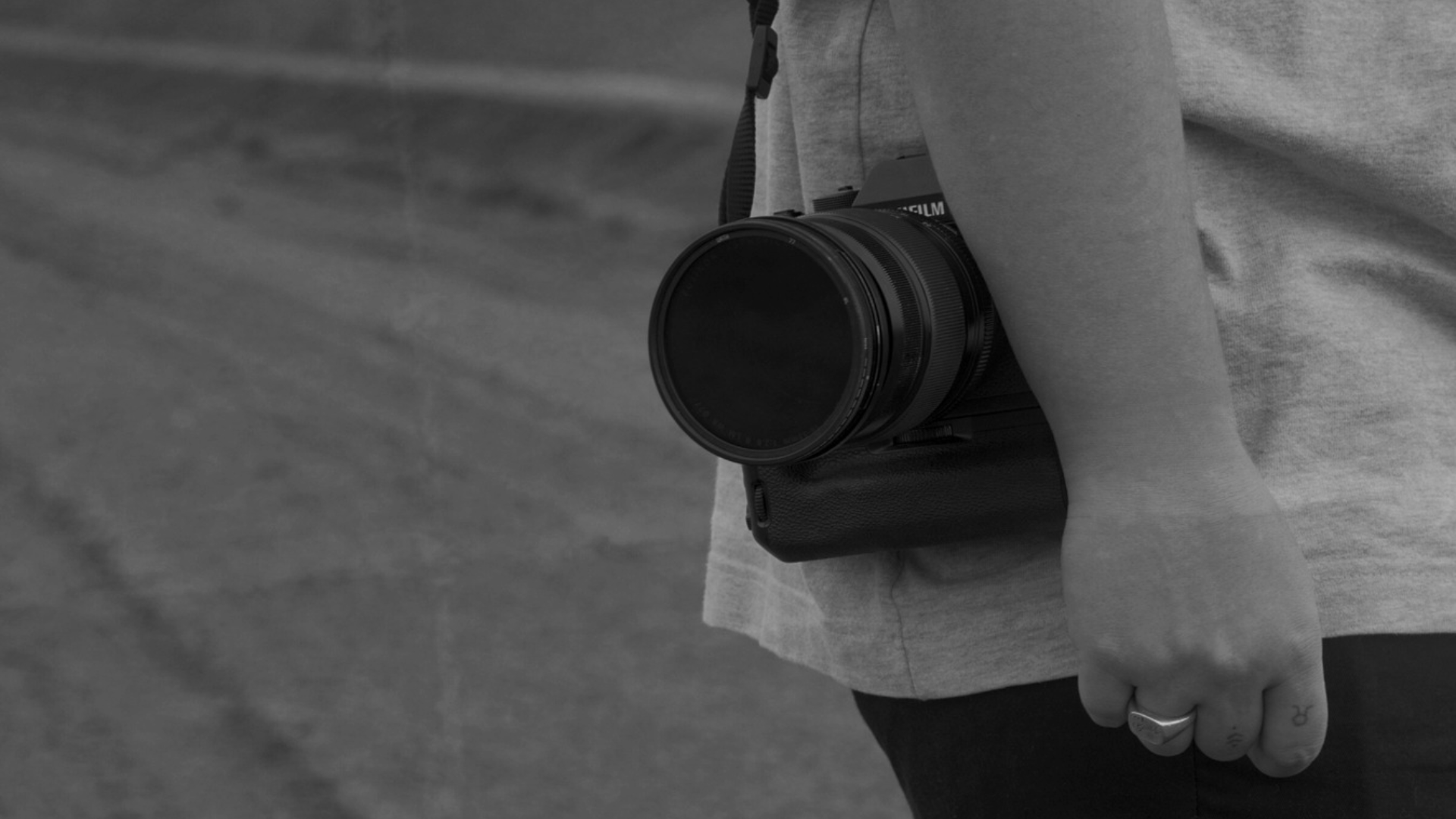 Nic Maloney with a camera during her early years working in photography and creative production.