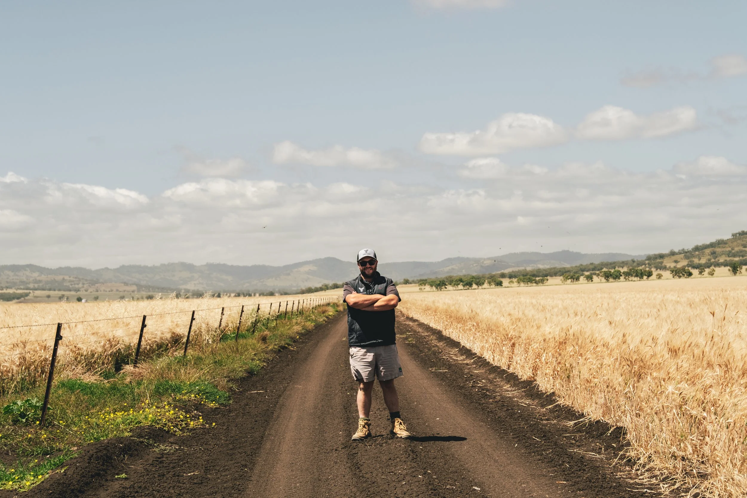 Agricore agronomist inspecting crop conditions and seasonal performance.