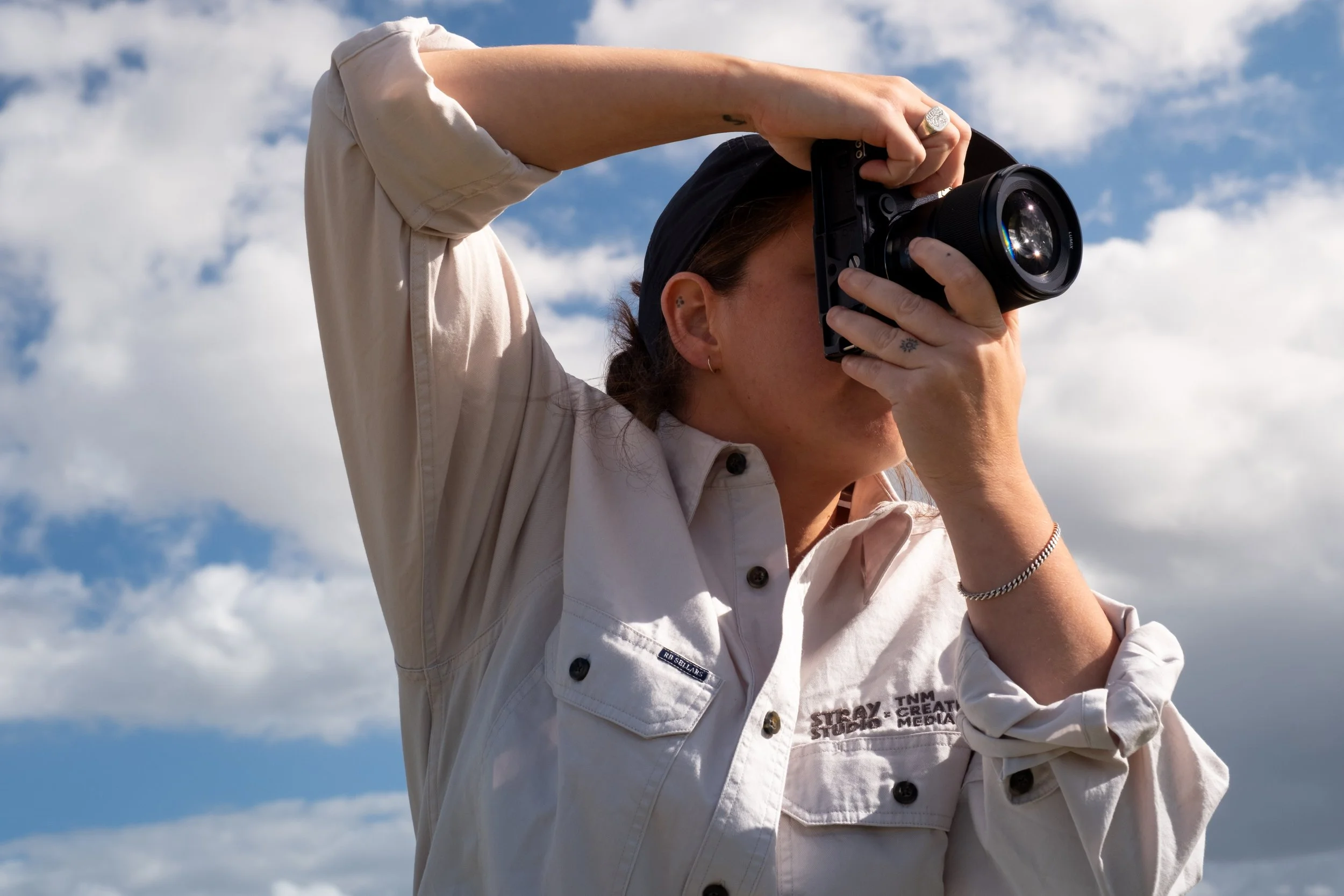 Nic Maloney photographing on location during a content production, documenting the people, places and processes that shape regional businesses.
