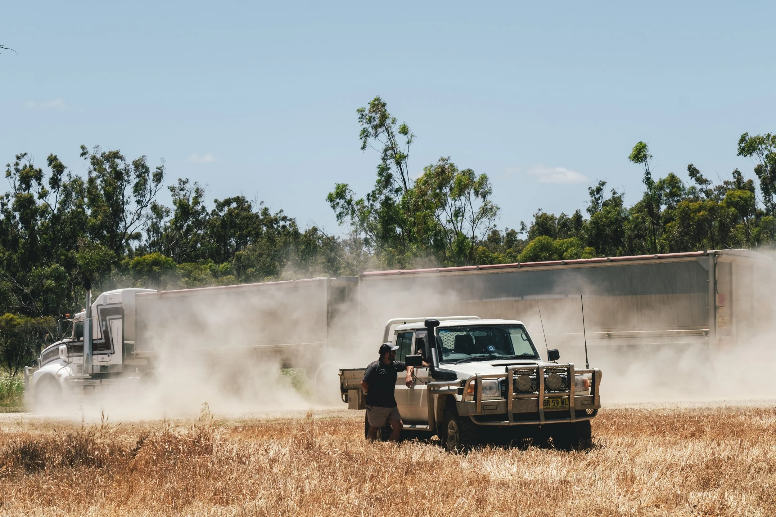 Agronomist and vehicle at Hudson Farm, photographed as part of the Agricore case study exploring long-term agricultural partnerships.