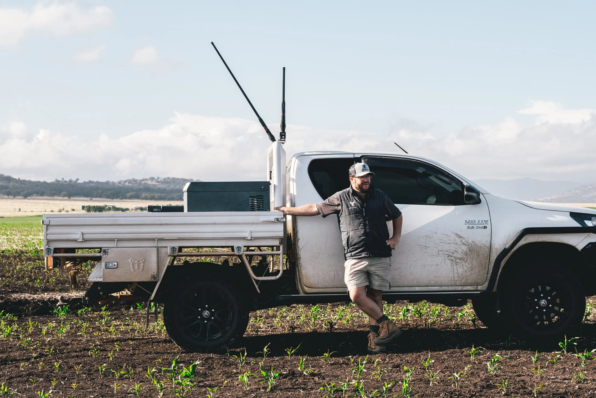 Agricore agronomist inspecting crop performance during the growing season.