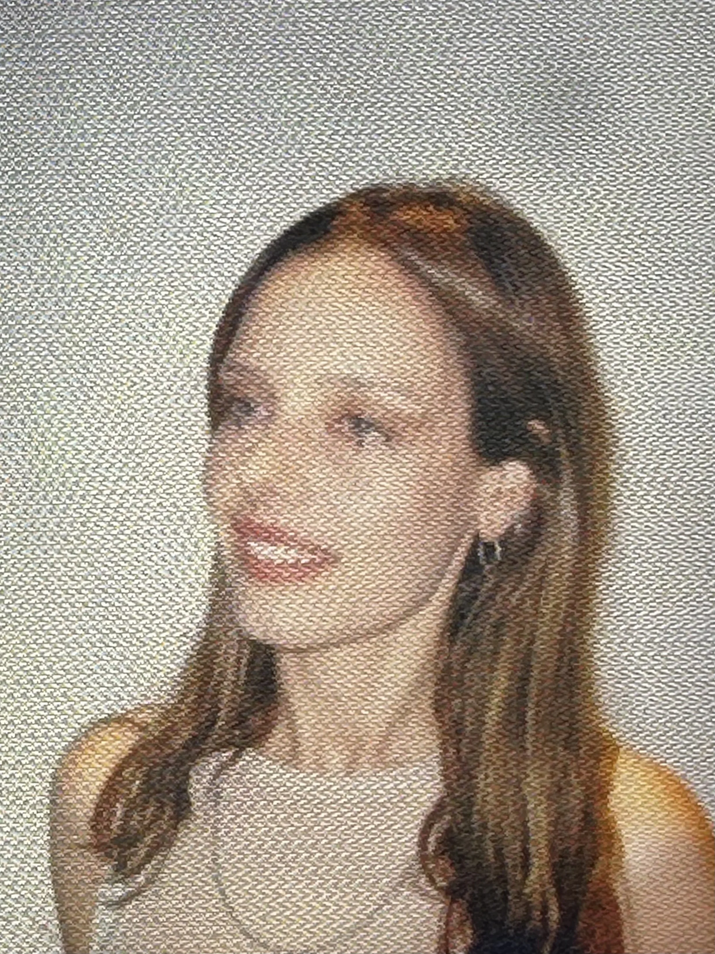 Artist with long brown hair.