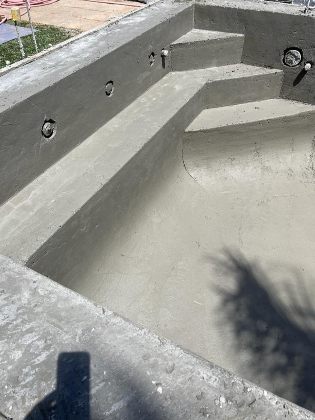 Pool steps under construction on one of our projects.