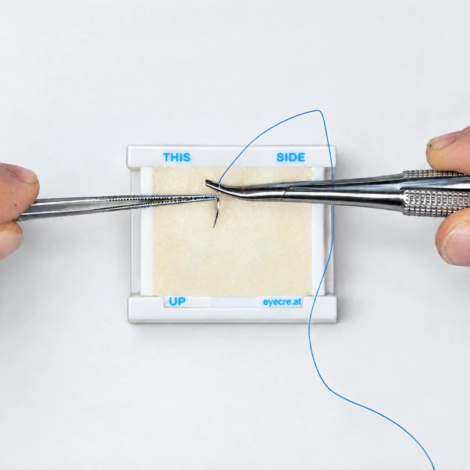 Conjunctival suturing practice with needle holder and forceps on the Kit 4 Conjunctival Suturing, eyecre.at