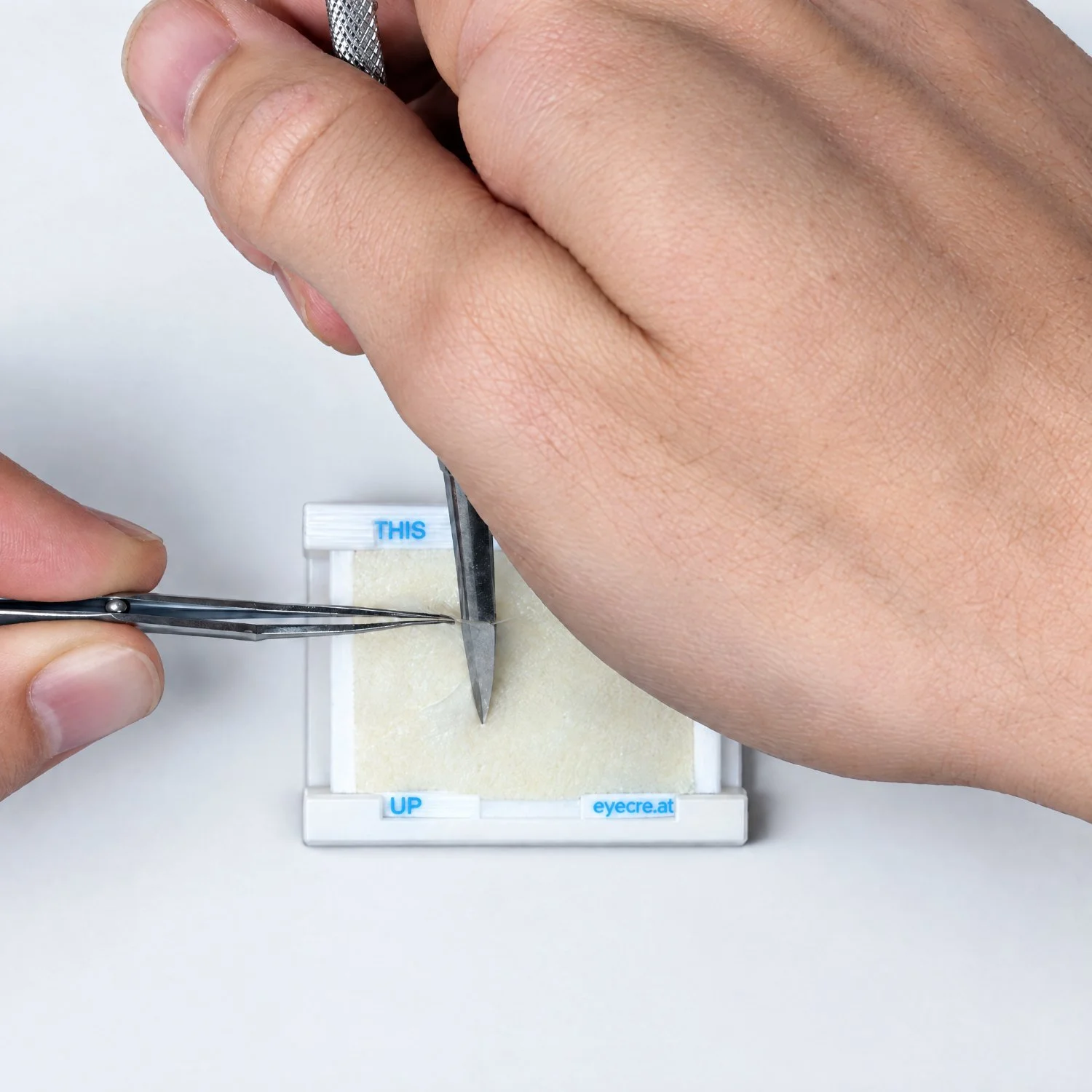 Hands suturing on the Pad 4 ConjSuturing under training conditions, eyecre.at