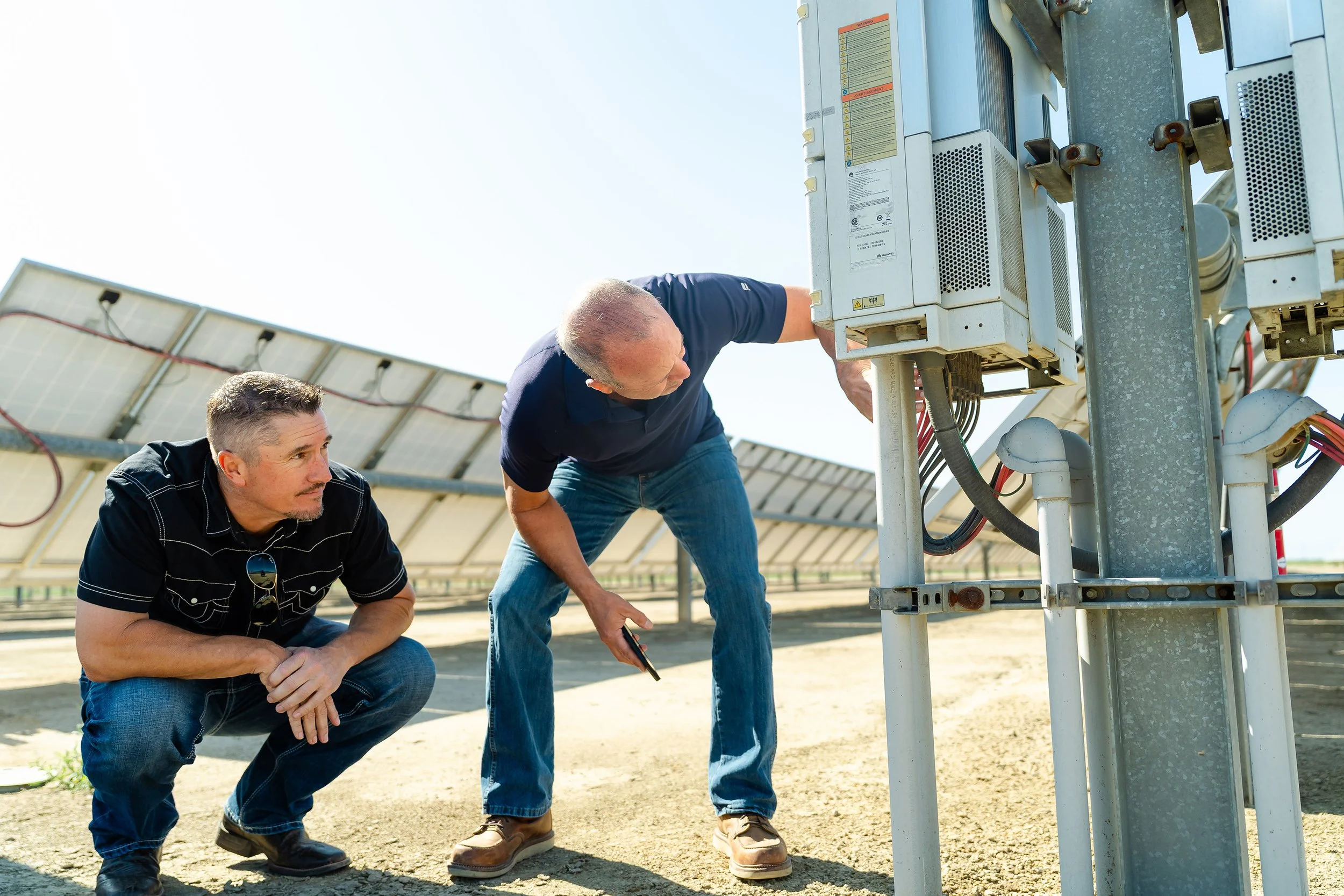 Damon and David Looking at Solar