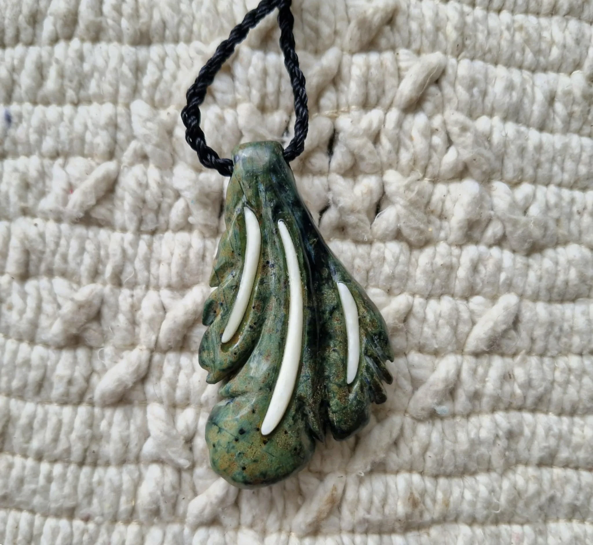 Feather pendant