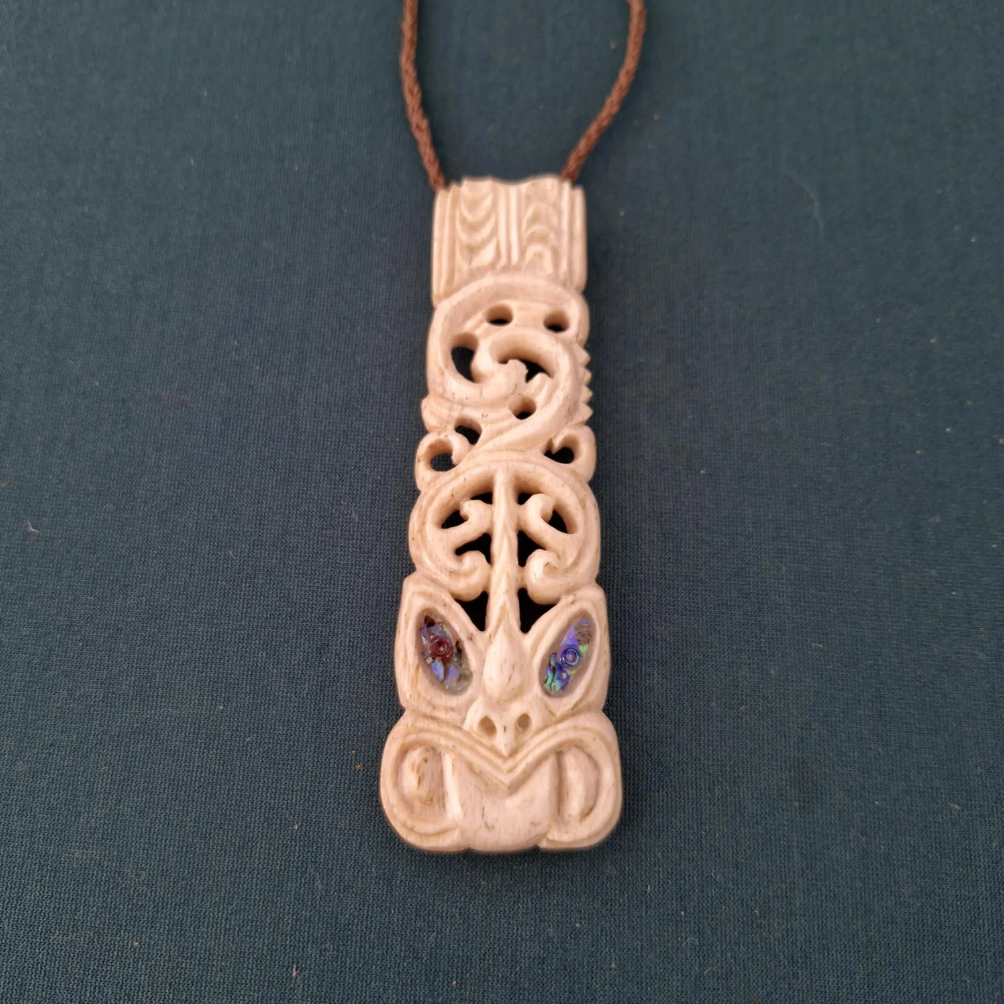 Whale bone 'wheku' pendant