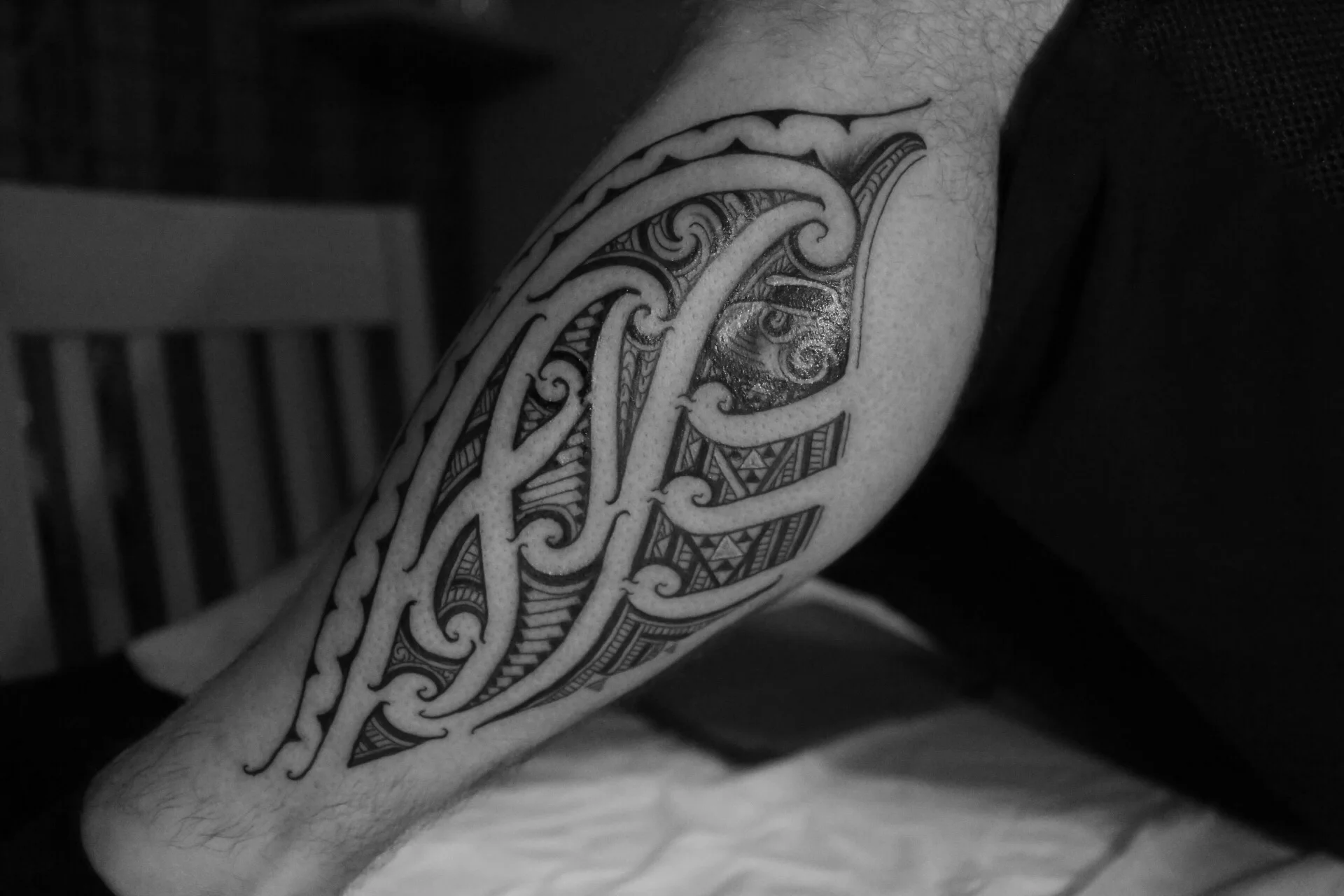 Andys completed ink with Maori curling stone.