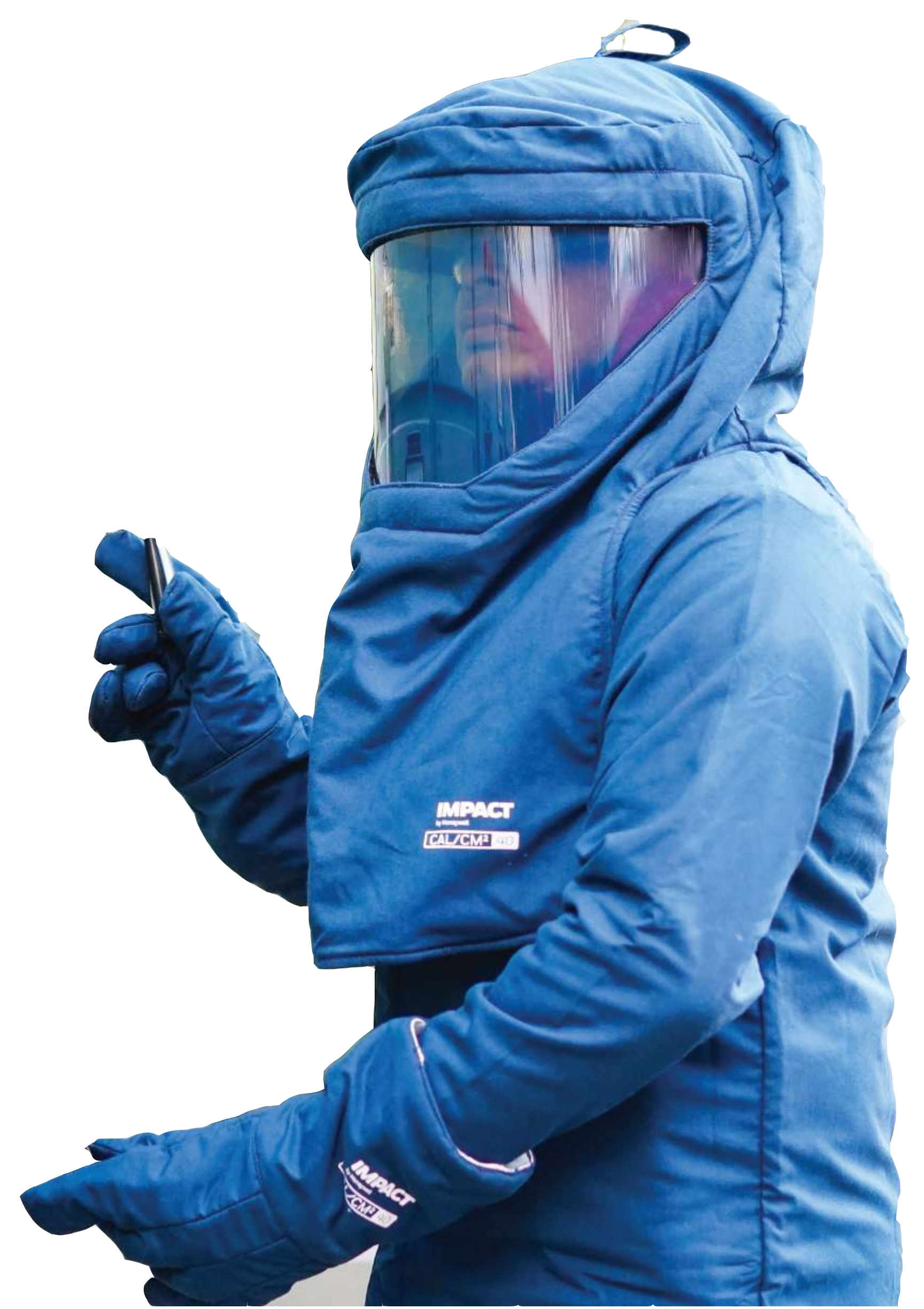 A person wearing a blue padded jacket with branding and a face shield, holding a smartphone.