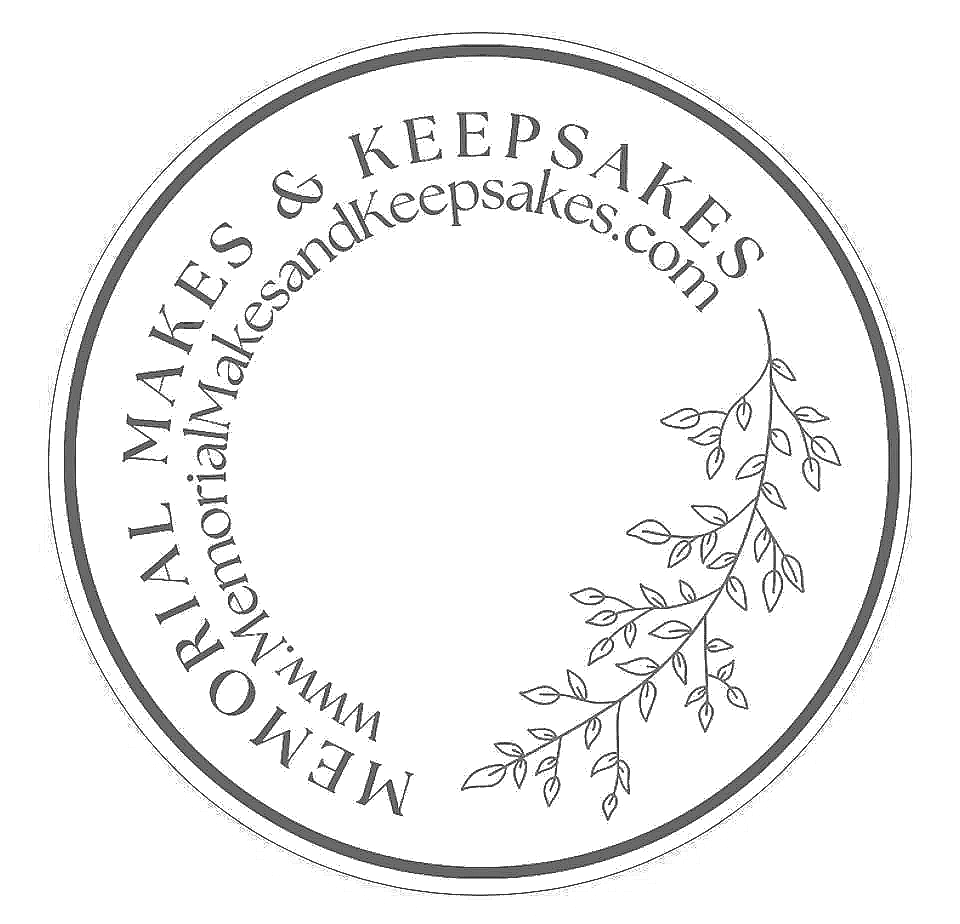 A circular sticker with the text "Memorial Makers and Keepsakes, www.memorialmakersandkeepsakes.com" and a decorative line with leaves on the right side.