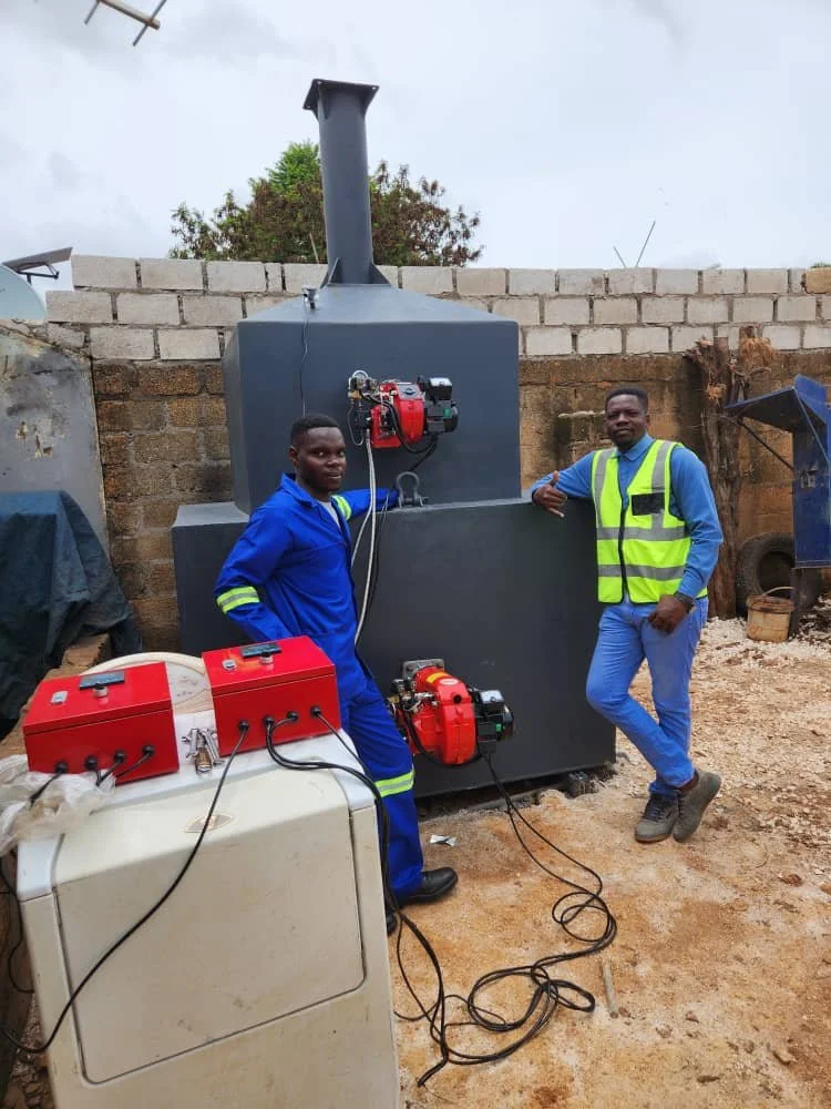 Detlaxe Employees working on the Hellfire Incinerator at Chilenje Level One Hospital.