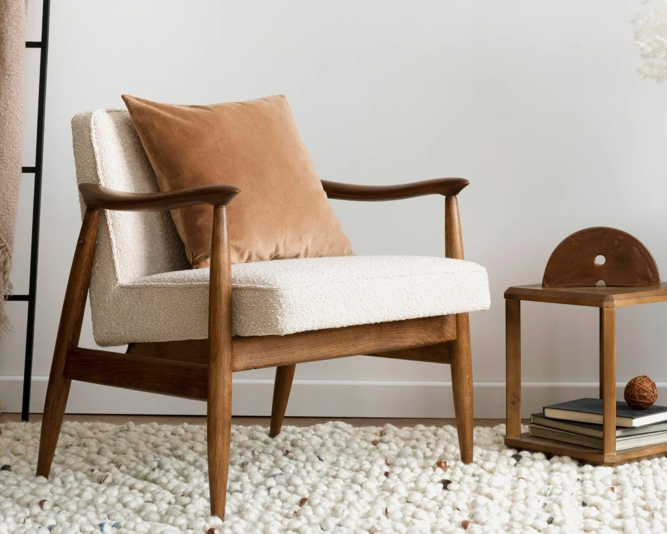 A wood frame mid-century armchair for a Bend Oregon Real Estate Market home staging service.