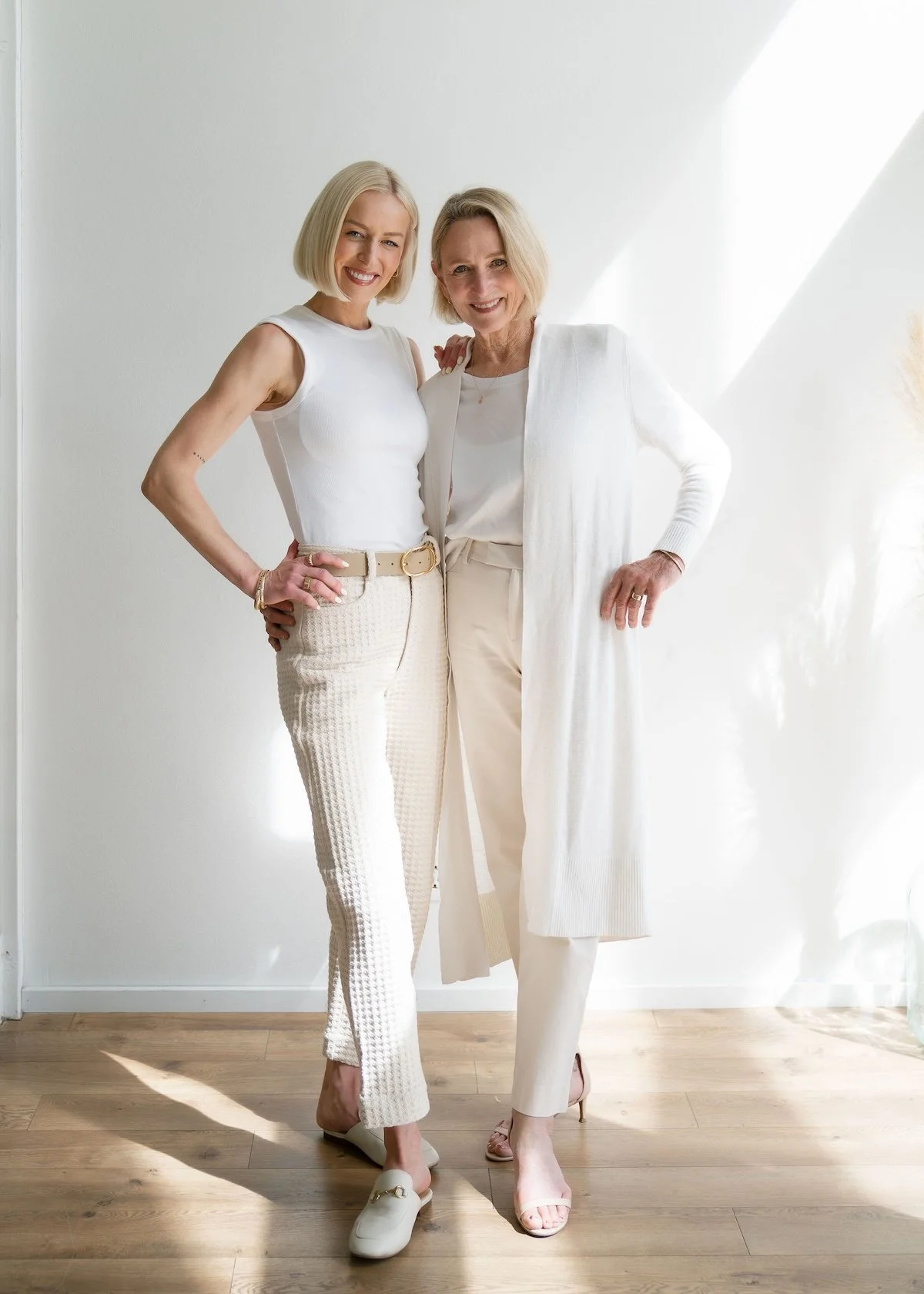 Two blond women in neutral-colored outfits. Sherry and Chelsea Ortega are The Best Bend Oregon Real Estate Agents near me.