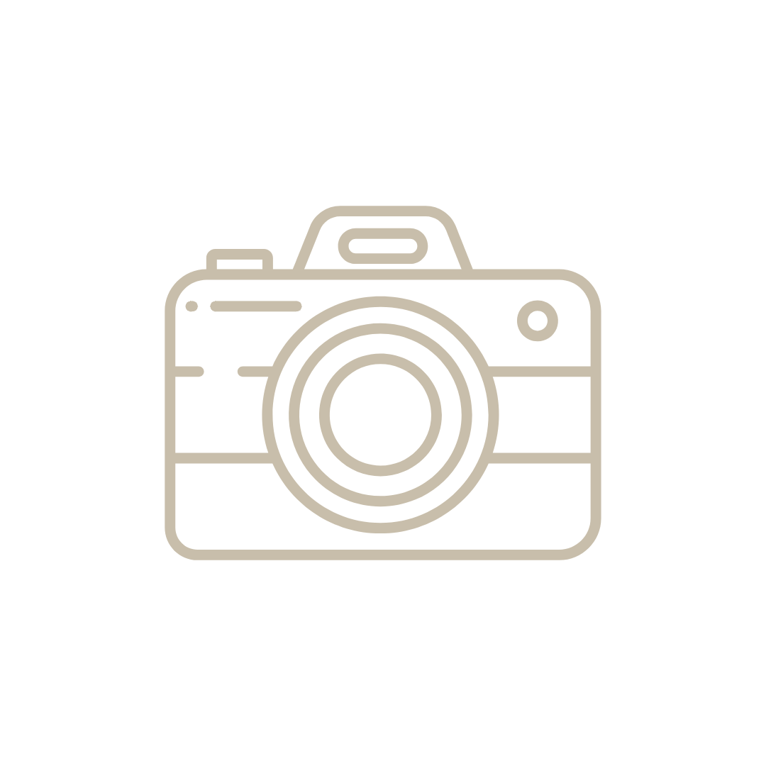 A camera icon with white background for a Bend Oregon Real Estate listing services.
