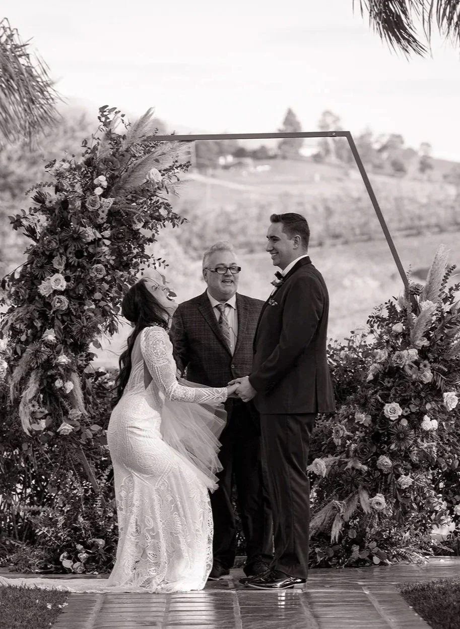 Bride and groom during a wedding ceremony at La Lomita Ranch in San Luis Obispo, photographed by Runaway Lovers