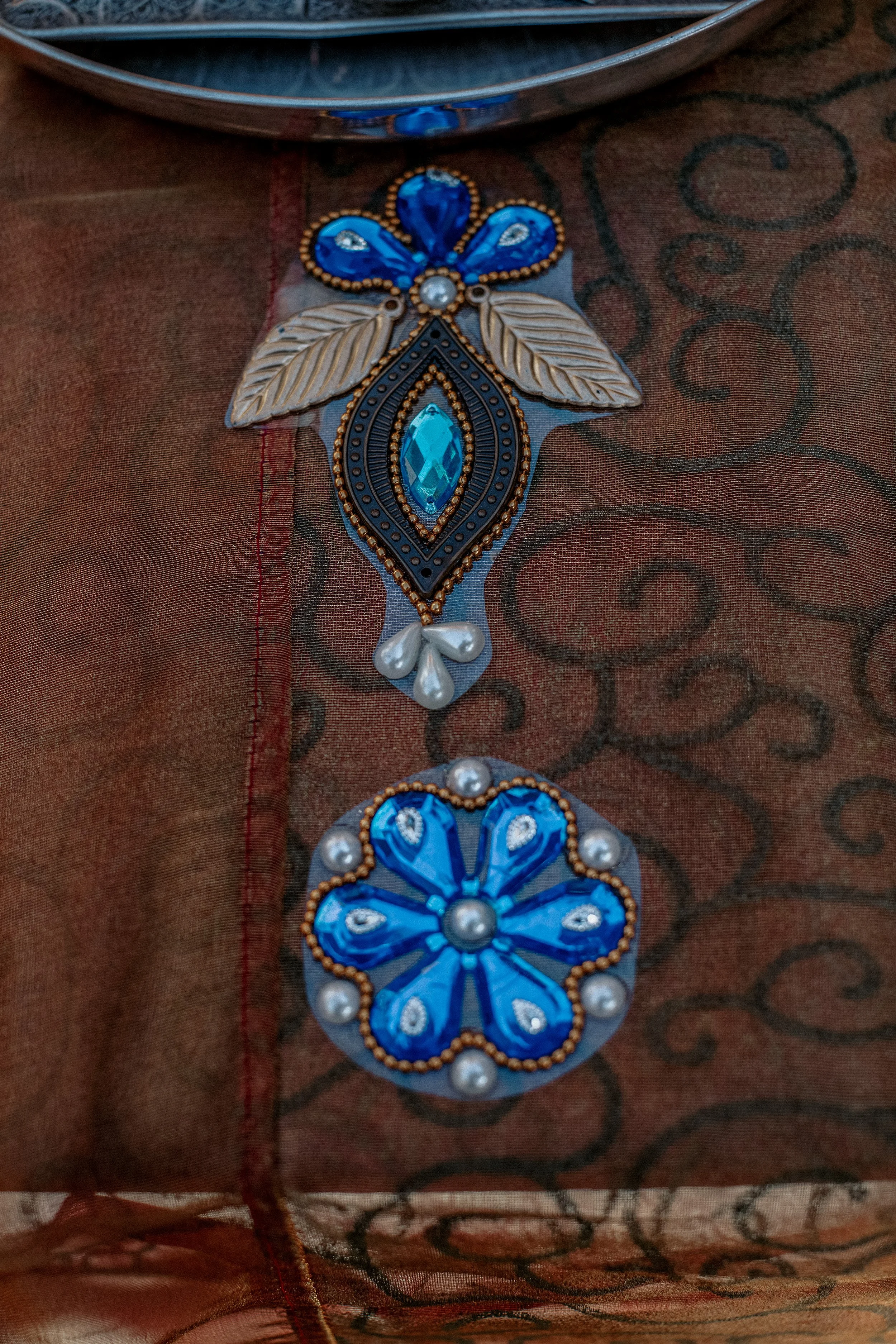 fabric with blue stones.