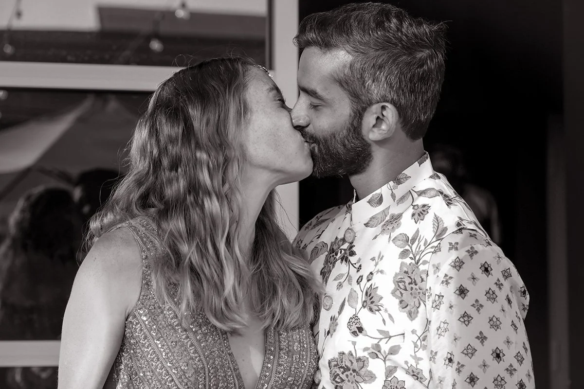 Couple sharing a kiss at SLO Brew Rock in San Luis Obispo