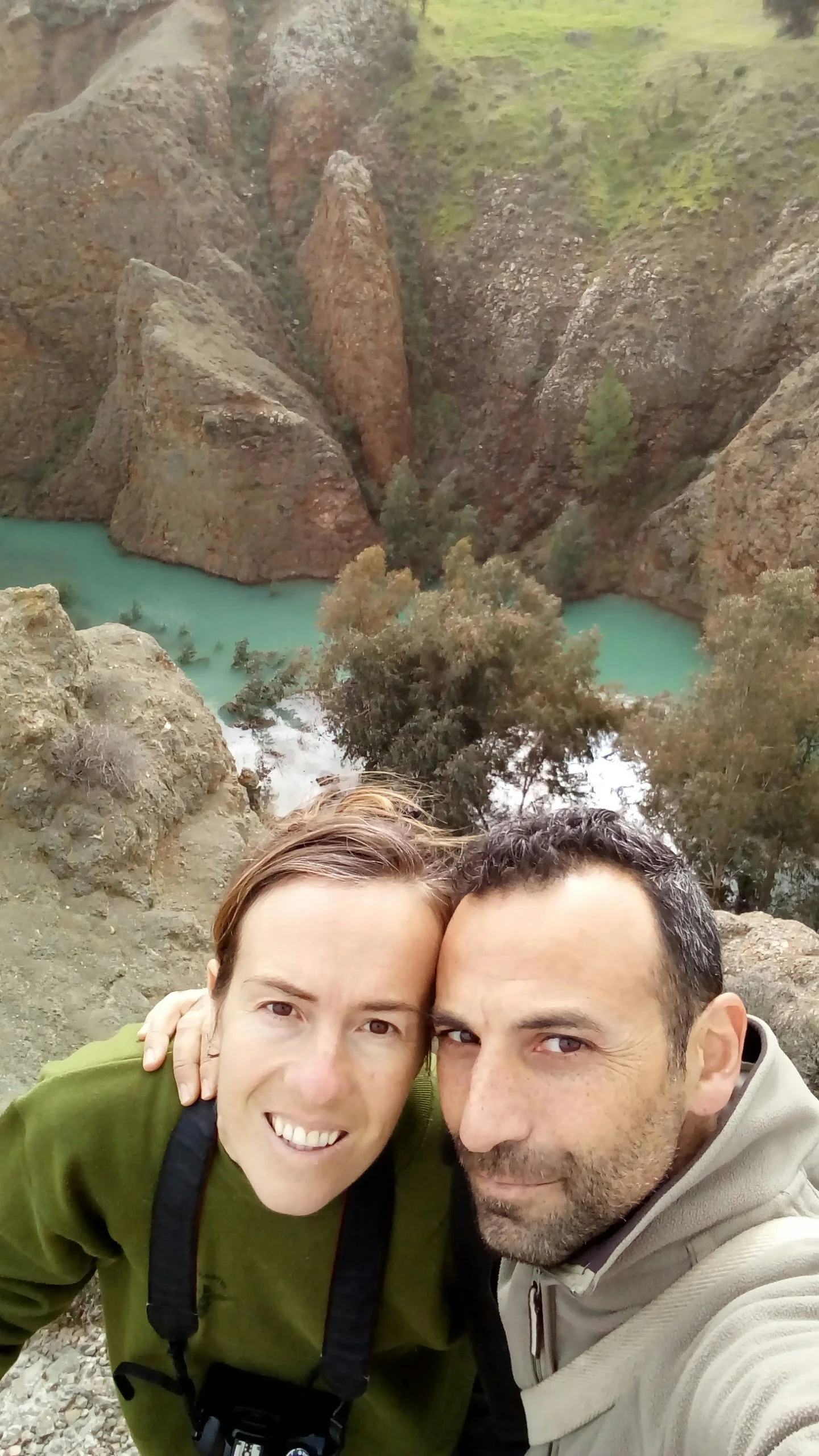 Owners of Aperanti standing above a gorge