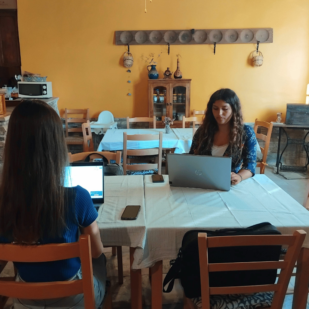 Digital nomads coworking on a table