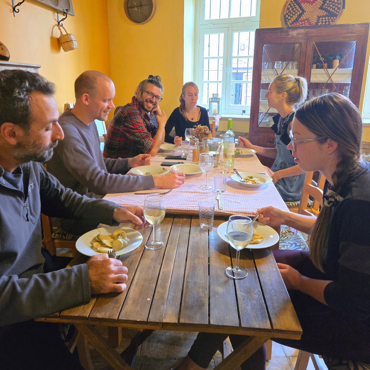 People sitting at a table for a meal
