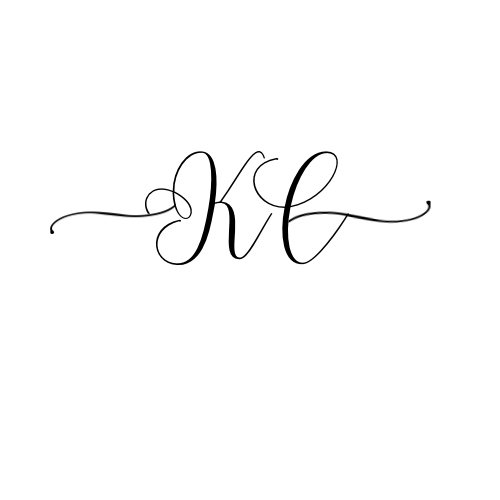 Elegant black cursive letters 'k' and 'c' intertwined on a white background.
