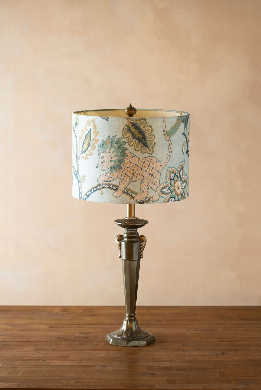 lamplit-atelier-jacobean-lion-print-drum-lampshade-glowing-editorial-interior.jpg