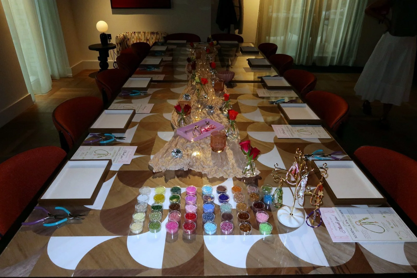 A private jewellery-making workshop laid out in a London residents' lounge, ready for guests to arrive.