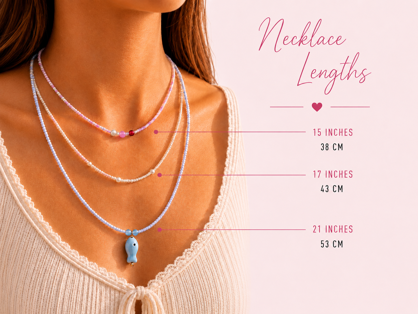 Necklace Length Guide with Layered Seed Bead Necklaces. Necklace length guide showing three layered handmade seed bead necklaces worn with a cream top, labelled 15, 17 and 21 inches with pastel beads, pearl details and a blue fish charm.