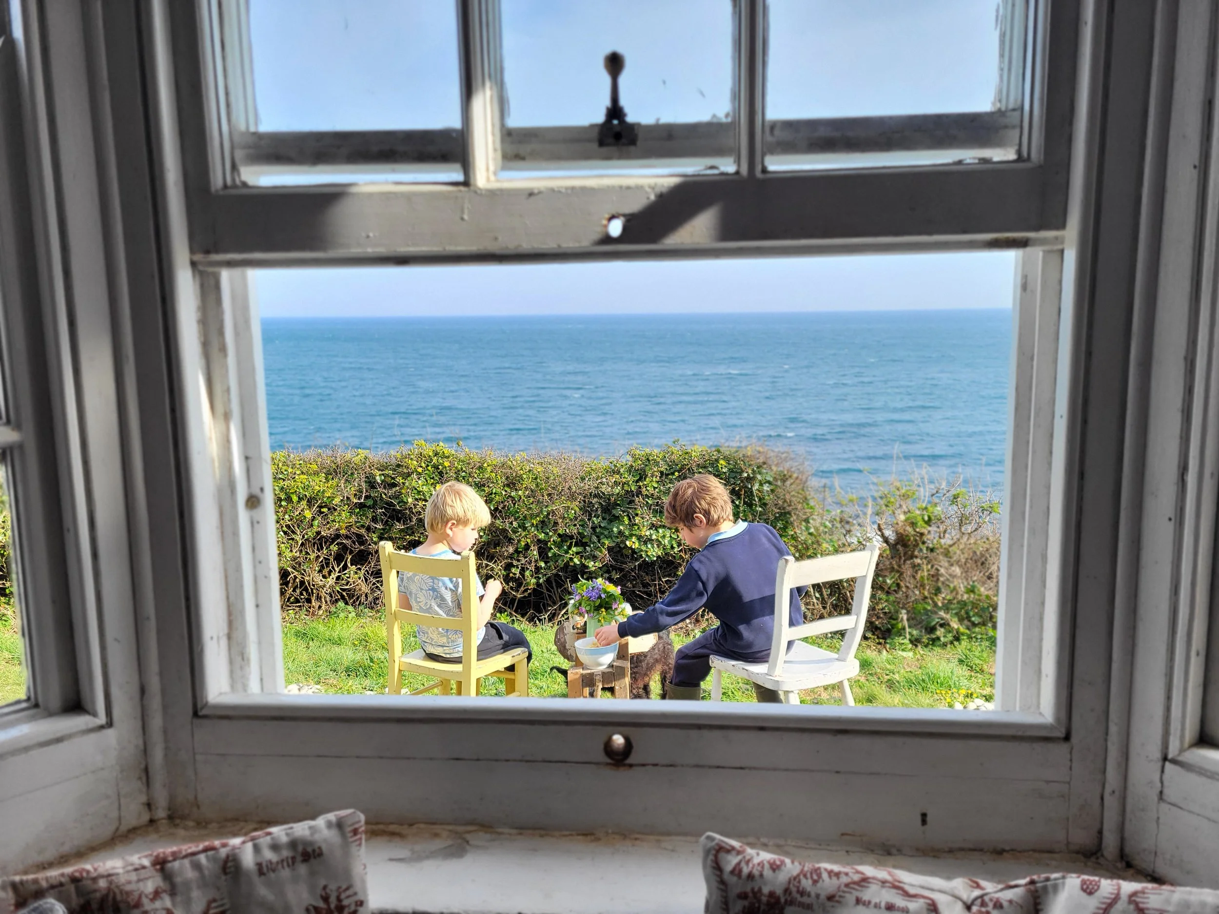 1 Window boys on chairs outside - Copy.jpg