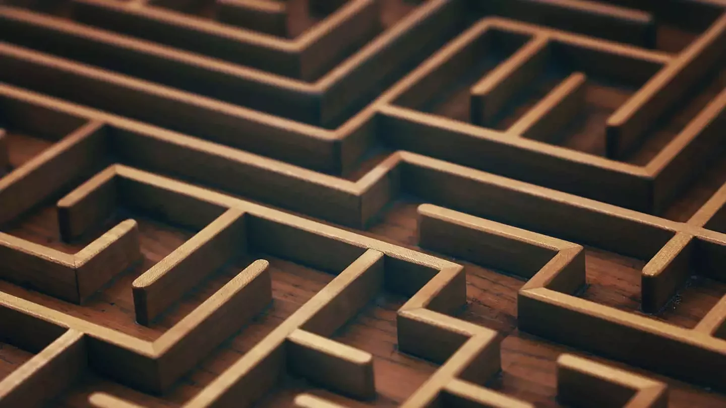 Close-up of a wooden maze for the contact page of Simon McCauley Counselling therapeutic practice in Fourways, Randburg.