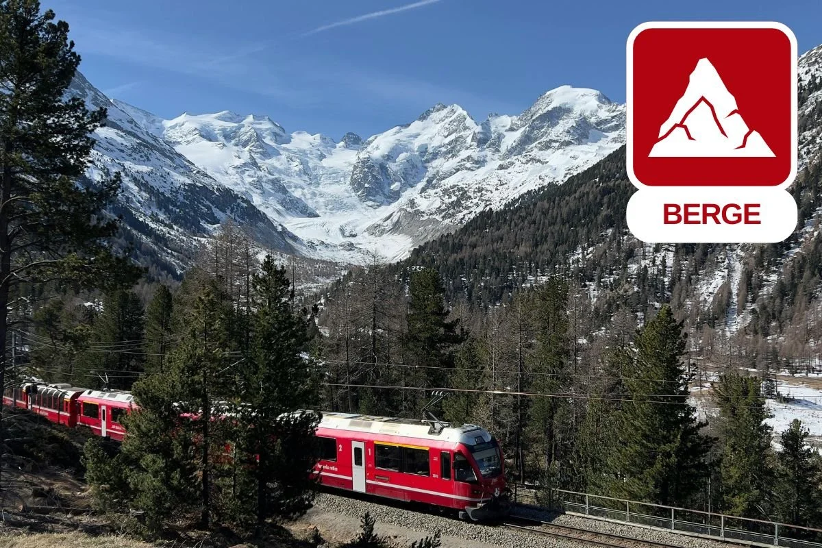 Piz Bernina im Engadin mit Zug der Rhätischen Bahn vor dem Bernina Bergmassiv