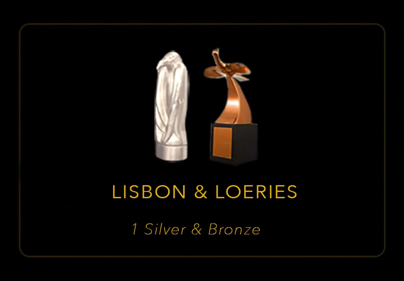 Image of two awards, one silver and one bronze, with the text "Lisbon & Loeries" and "1 Silver & Bronze" on a black background.