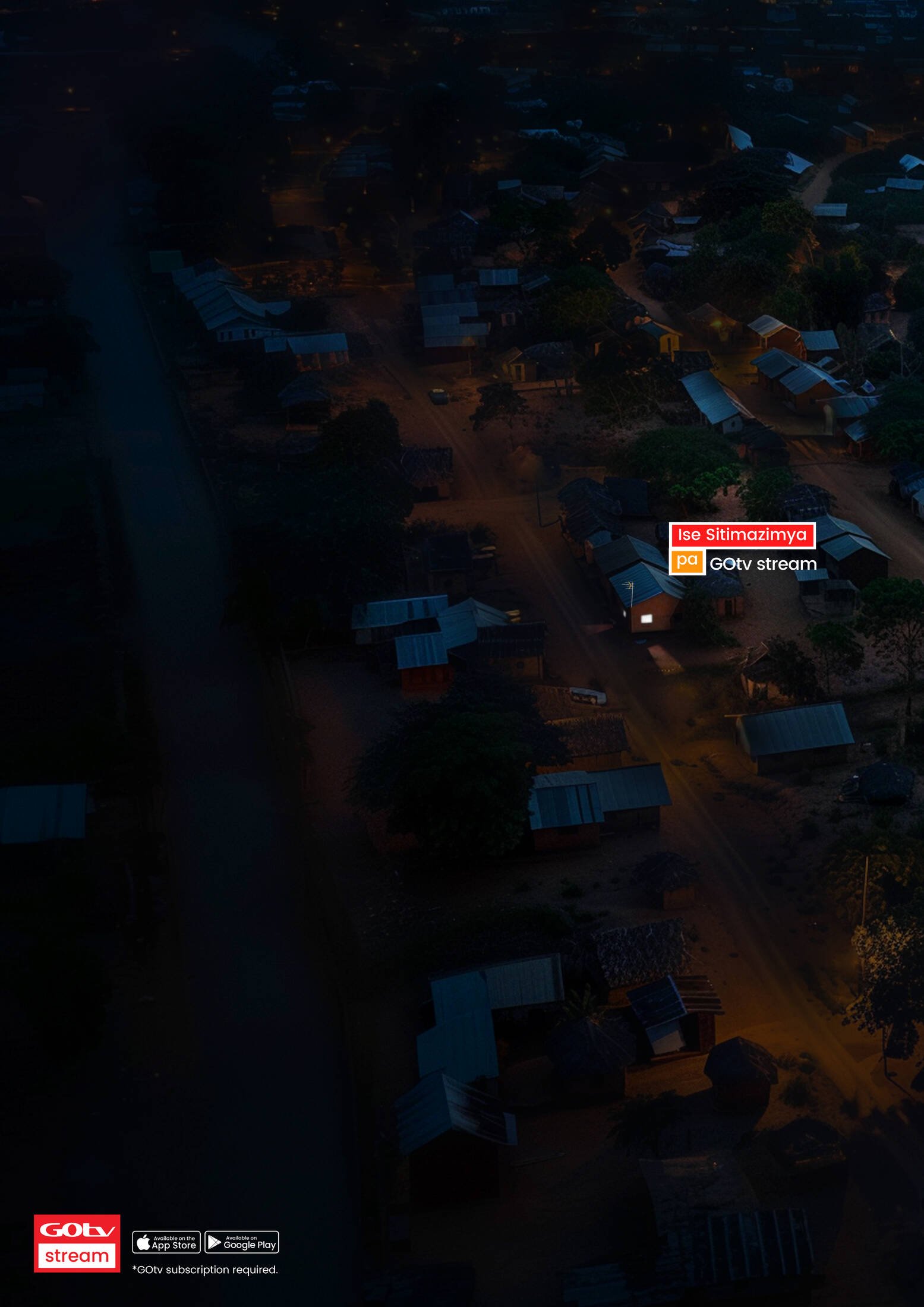An aerial view of a nighttime village scene with small houses, some with metal roofs, streets, trees, and scattered lights. There is a logo in the bottom left corner for 'GOV stream' and app download icons.