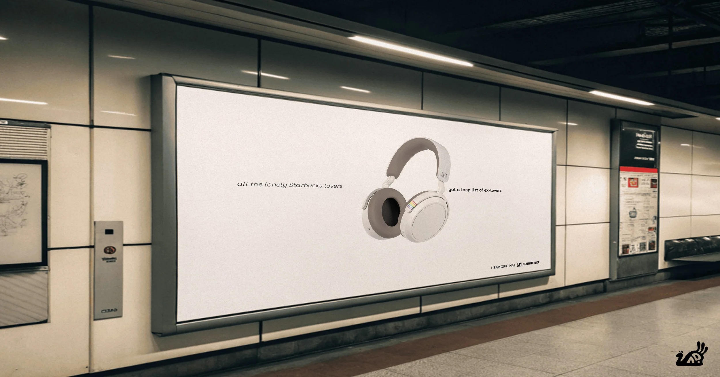 A large advertisement for Sennheiser headphones in a subway or train station. The ad features an image of white over-ear headphones with the text 'all the lonely Starbucks lovers' and 'got a long list of ex-lovers' written beside the headphones. There are some smaller texts and logos at the bottom of the ad.