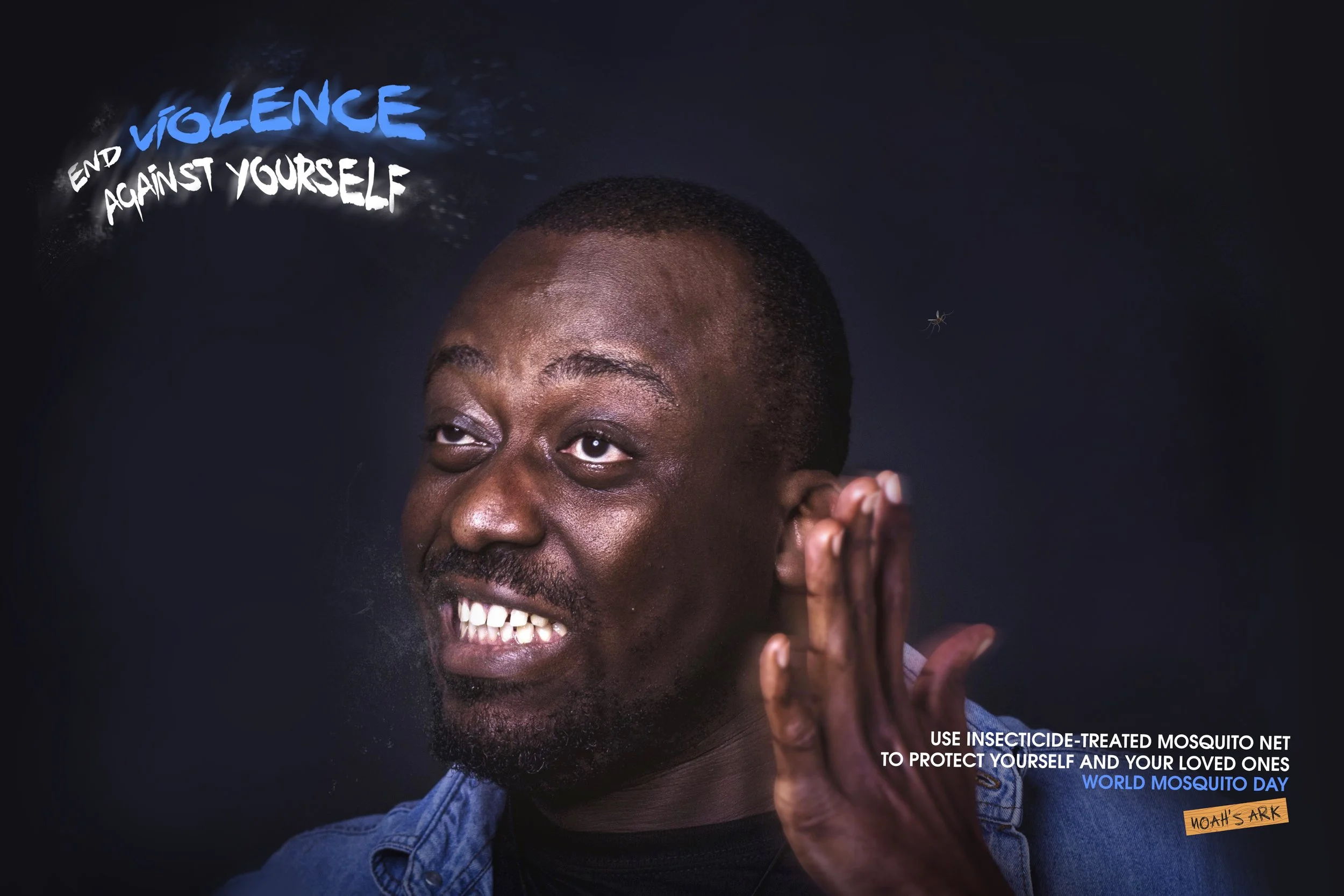 A smiling man with short hair and a mustache, wearing a blue shirt, holding his hand near his ear, with added text about insecticide-treated mosquito nets and World Mosquito Day. Sodiq Sheu Olashile, Best Art Director in Nigeria.