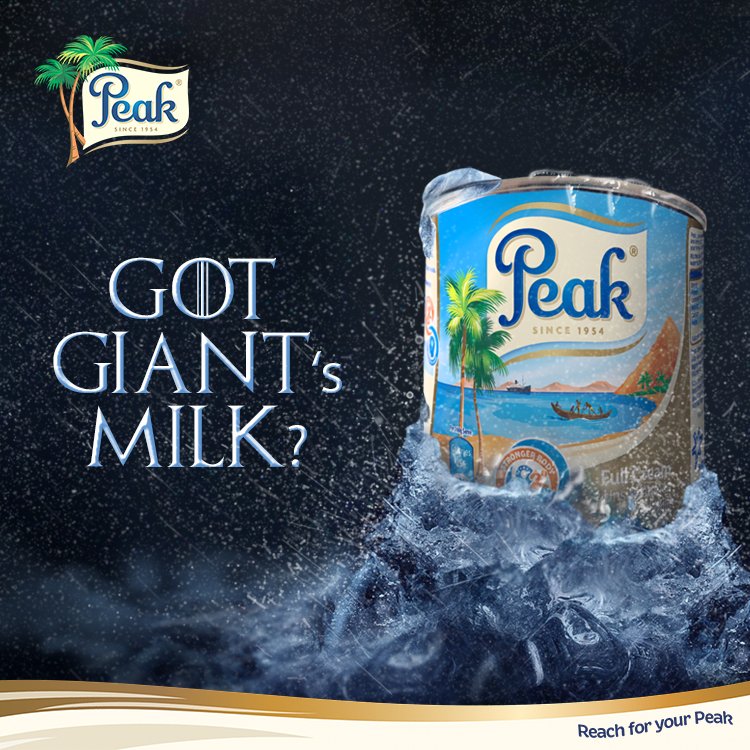 Advertisement showcasing Peak brand coconut milk in a can, with a tropical island scene and boat on the label, surrounded by splashing ice water, with the slogan 'Got GIANT's Milk?'