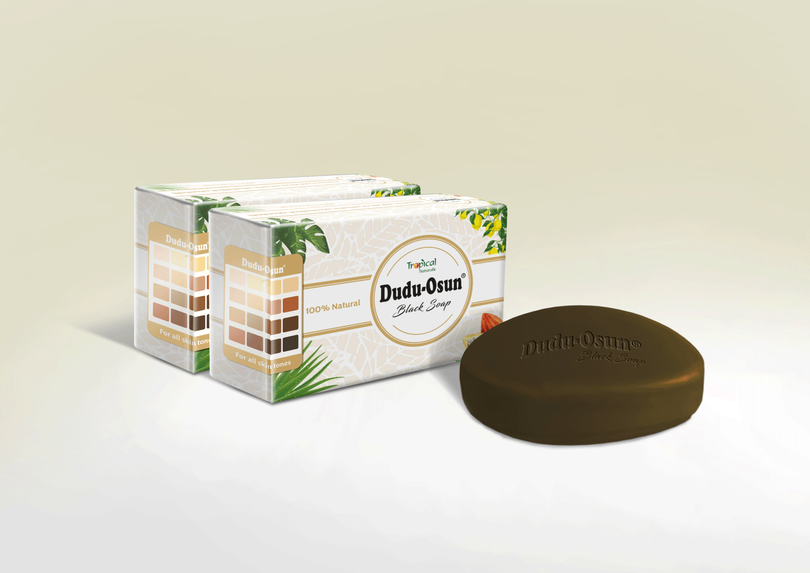 Two boxes of Dudu-Osun Black Soap, with soap bar in front, on a white background.